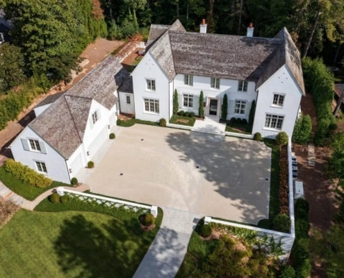 Stone-coated metal specialty roofing on residential home