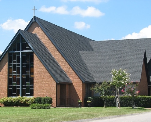 Modern church building with new metal roofing