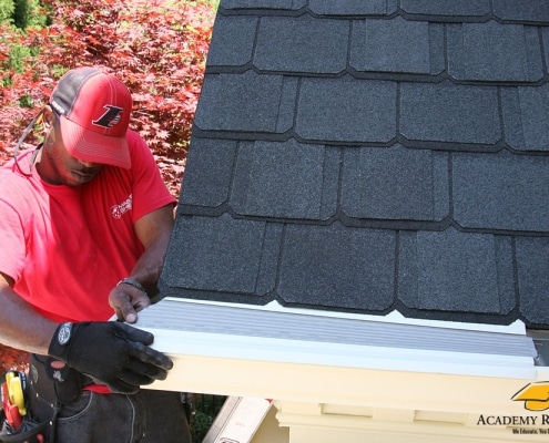Academy Roofing team installing Senox gutter system