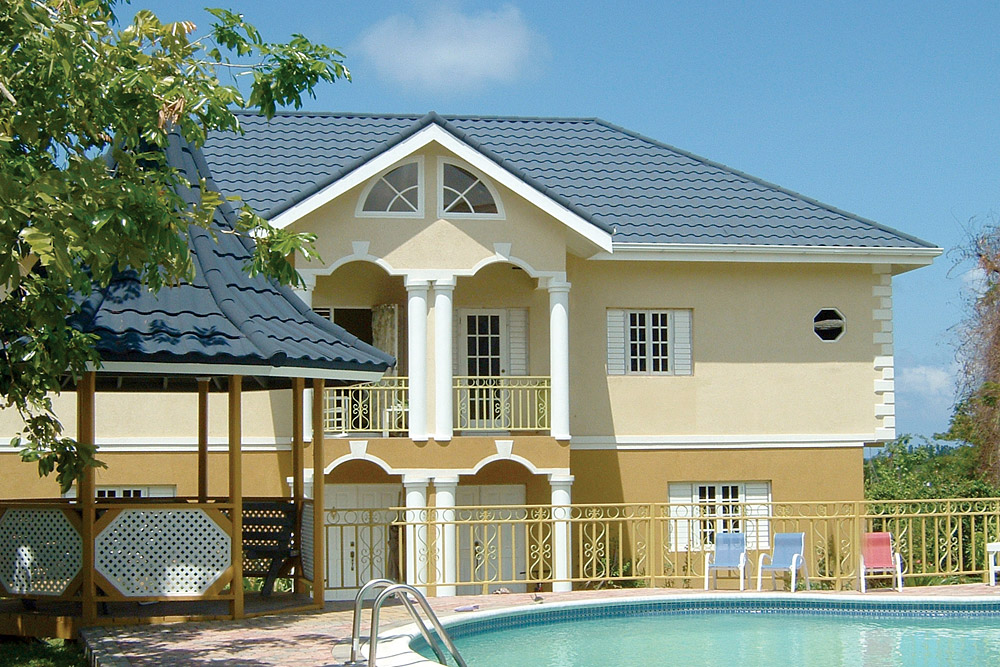 metal-roofing-1 Metal roofing on residential home with swimming pool in Georgia