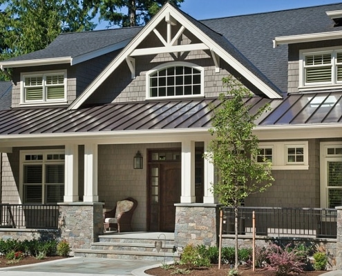 metal-roofing-3 Craftsman-style home featuring black metal roof system