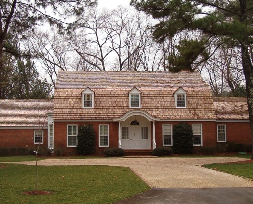 residential-roofing-5 Cedar shake roof installation on traditional brick home in Georgia