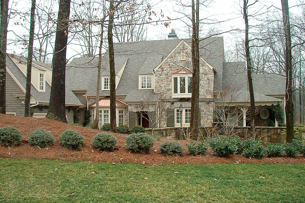 residential-roofing-6 Stone house with GAF Timberline HD shingles and copper valleys in Georgia