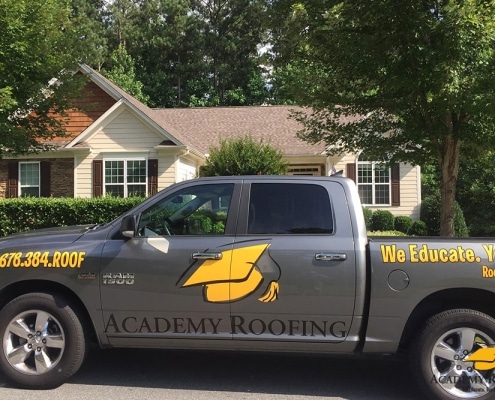 residential-roofing-9 Academy Roofing service truck at a Georgia residential project site