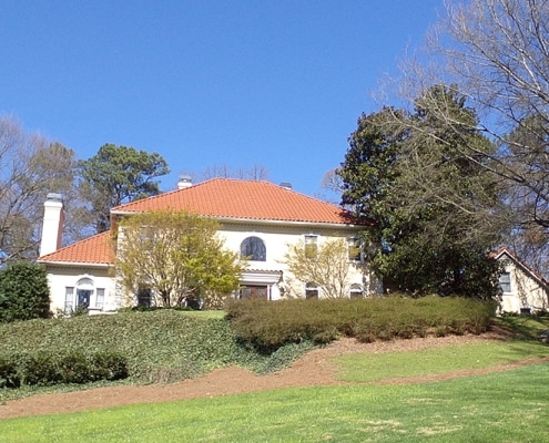 Luxury shingle roofing installation with custom architectural design