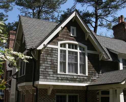 Cedar shingles and slate combination specialty roof