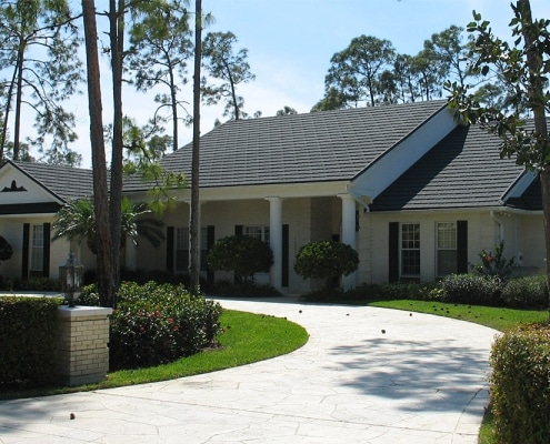 Night view of specialty roofing lit up on Georgia residence