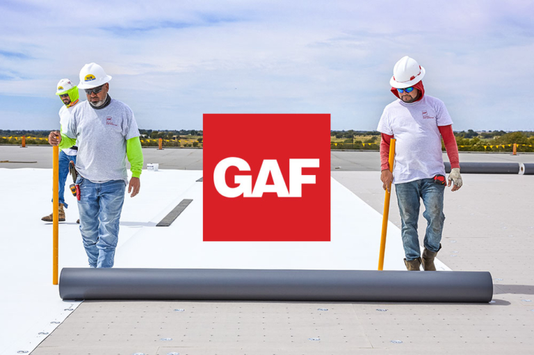 GAF-certified roofing contractors installing commercial flat roofing membrane with GAF logo overlay