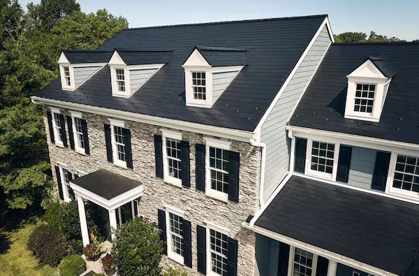 Elegant residential home with a GAF Metal Certified standing seam roof in black finish